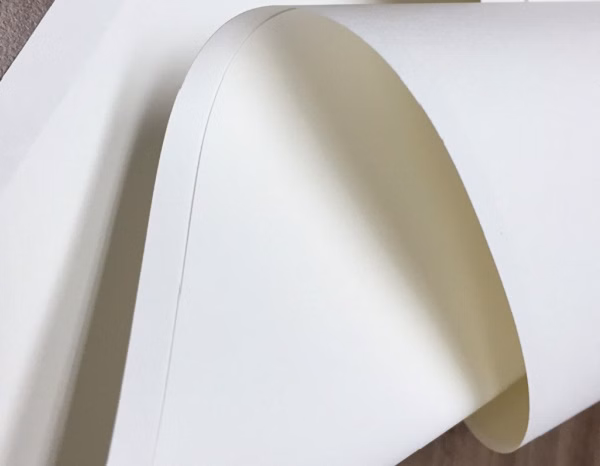 Giấy Couche là gì? Đặc điểm, định lượng và ứng dụng trong in ấn