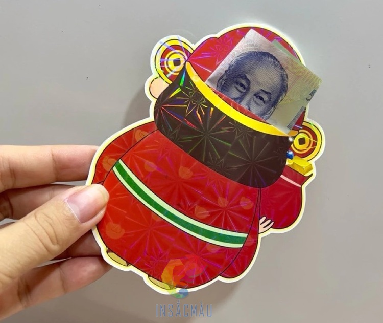 Mẫu bao lì xì thần tài bế theo thiết kế