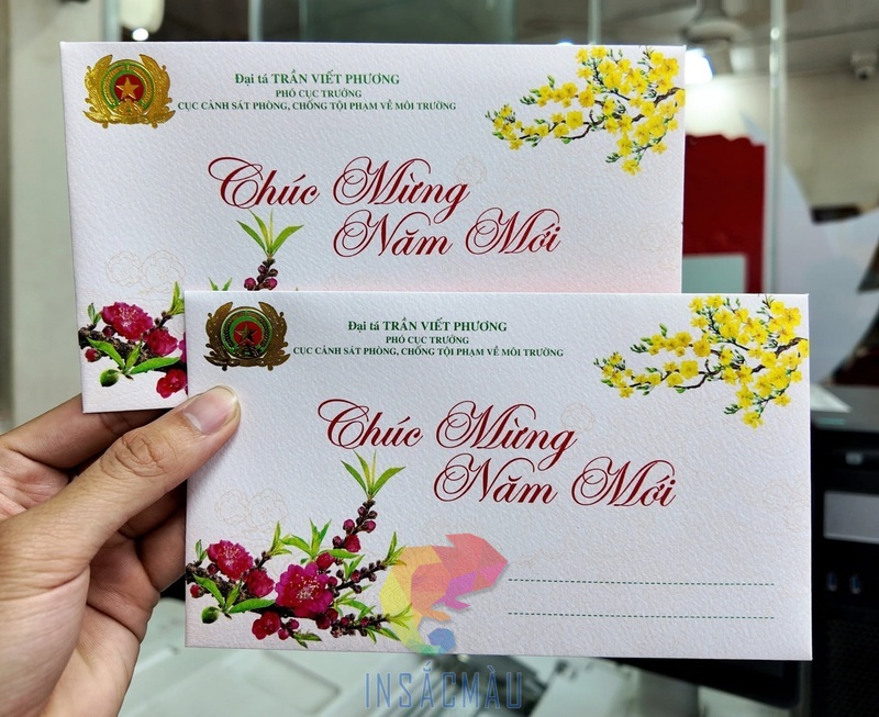 Mẫu phong bì chúc mừng năm mới 2027 in hình mai, đào